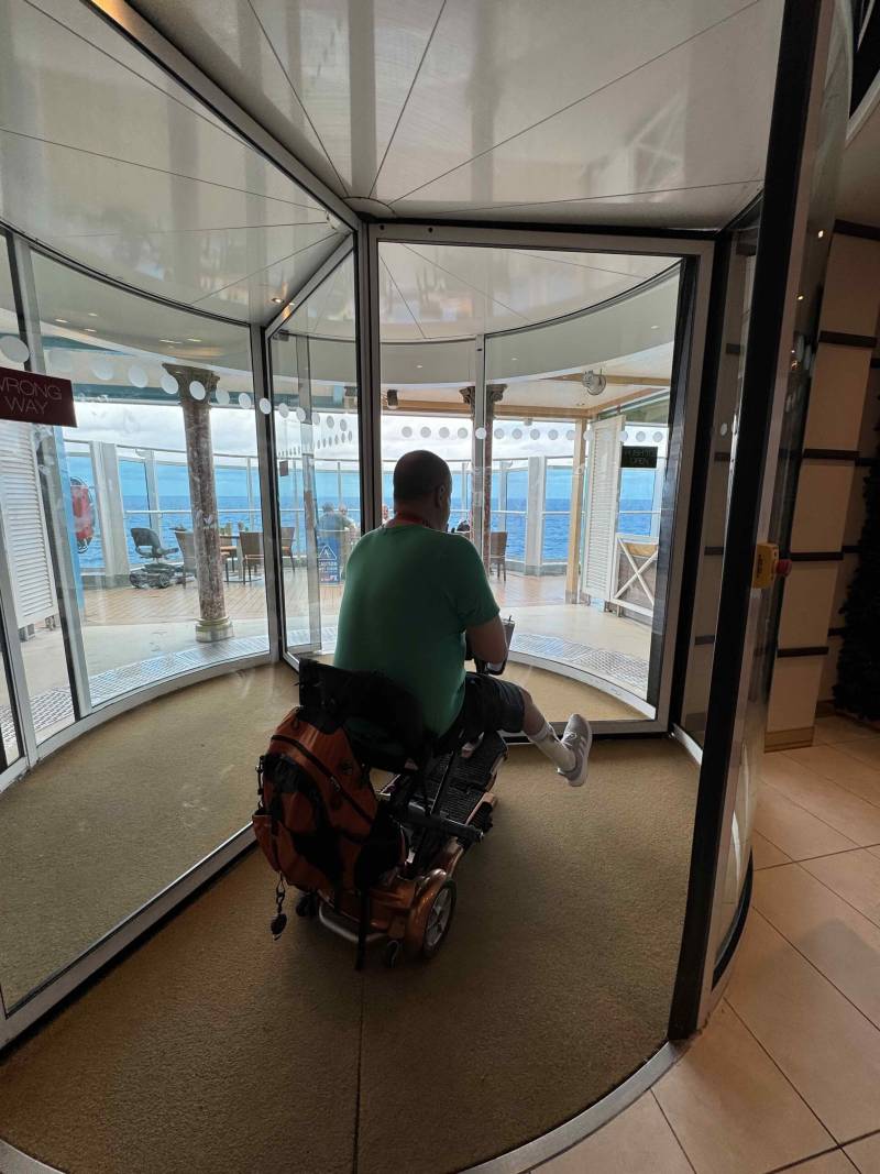 navigating a carnival venezia doorway while on a mobility scooter