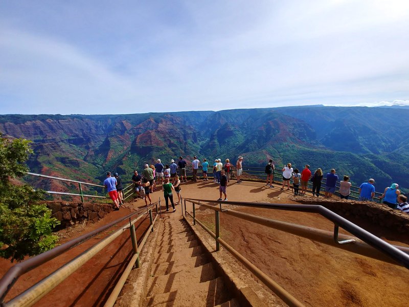 Visitors at a Waimea Canyon lookout on Kauai, the canyon known as the Grand Canyon of the Pacific