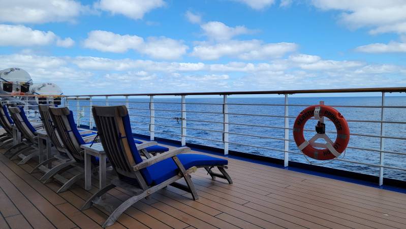 relaxing on deck watching whales from holland america line